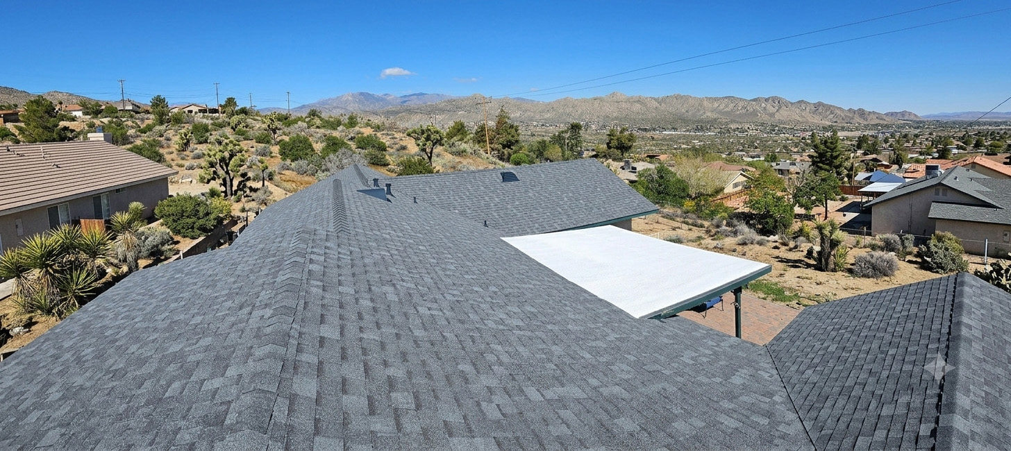 Roofworks professional roofing services in the Morongo Basin, showcasing expertise in architectural shingle and flat roof installations.